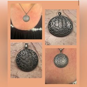 Sterling filigree floral design pendant